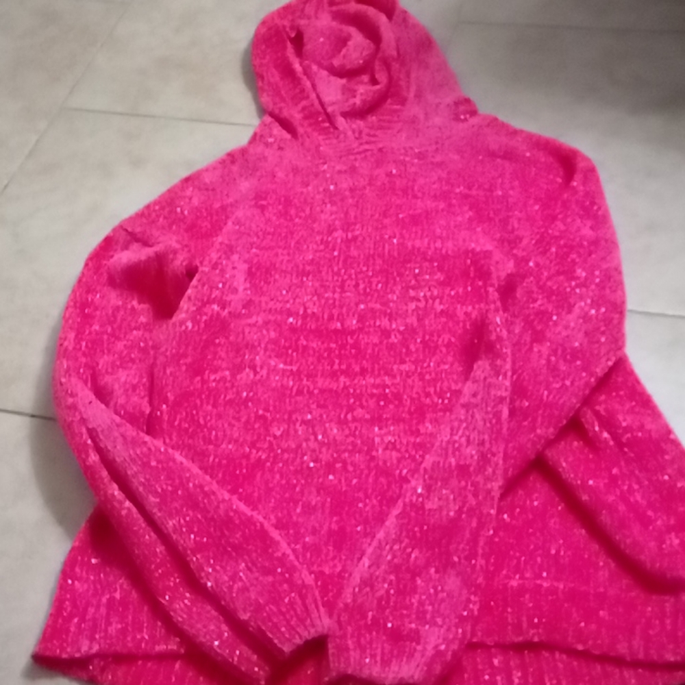 A pink sweater